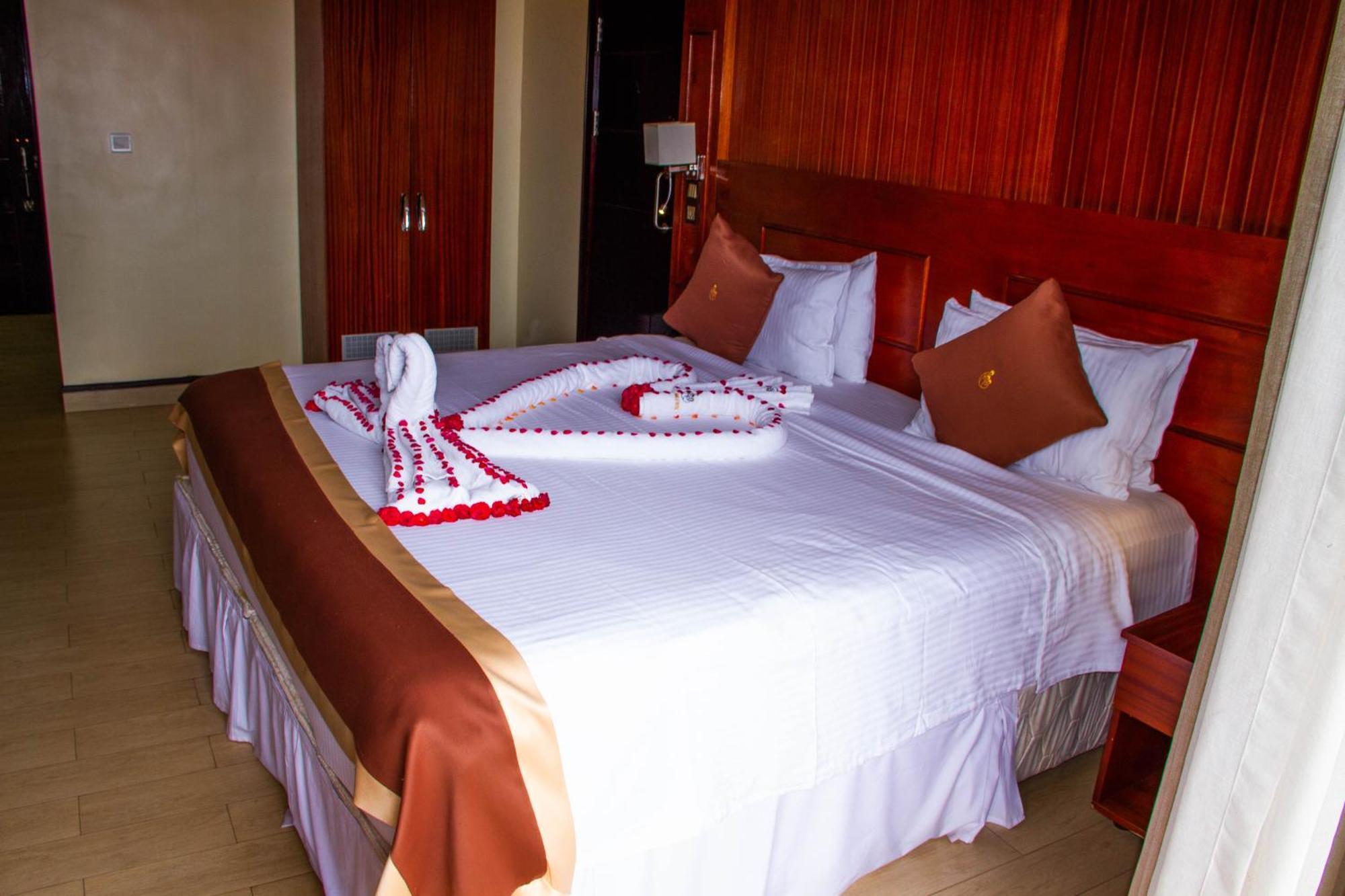 Sainte Famille Hotel Kigali Bagian luar foto